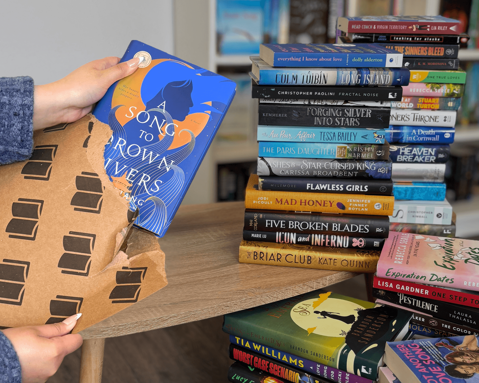 BKO package being opened to reveal beautiful books